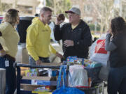 Natalie Zadak, aunt of Nick Zadak, from left, joins Nick’s dad, Robert, his grandfather, Chuck, and his mom, Katie, as they drop off toys in his honor at Randall Children’s Hospital.