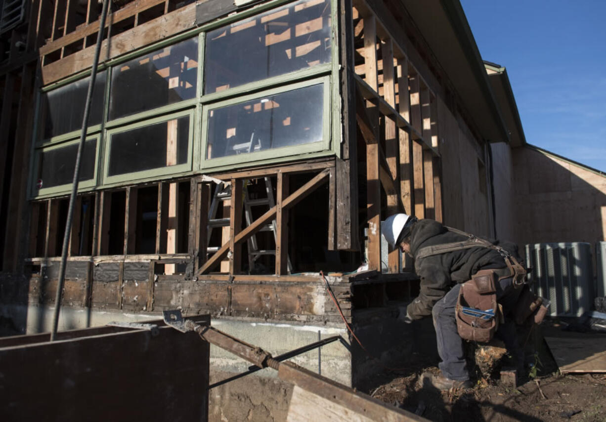 William McCrandall works on Clark County Adventist Community Services’ new building at 3114 E. Fourth Plain Blvd., which the organization bought from the Red Cross in July.