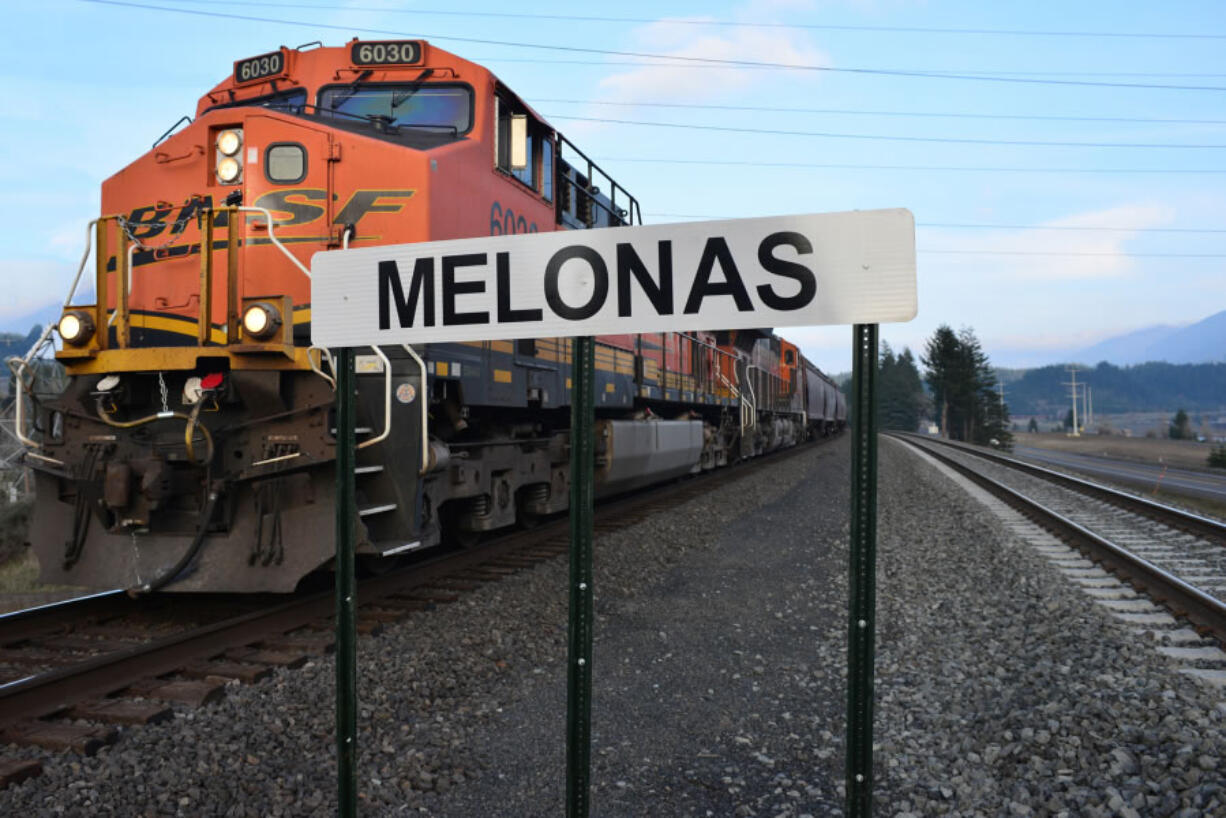 A BNSF train passes the Melonas siding west of Stevenson in the Columbia River Gorge. The stretch of track was named in December for a family with three generations of railroad workers.