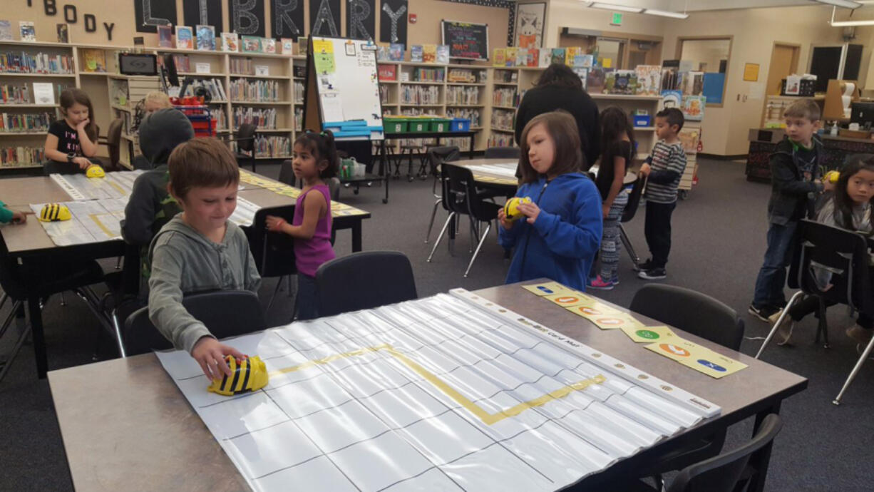 Five Corners: Orchards Elementary School kindergarten students use Bee-Bots to learn about problem solving.