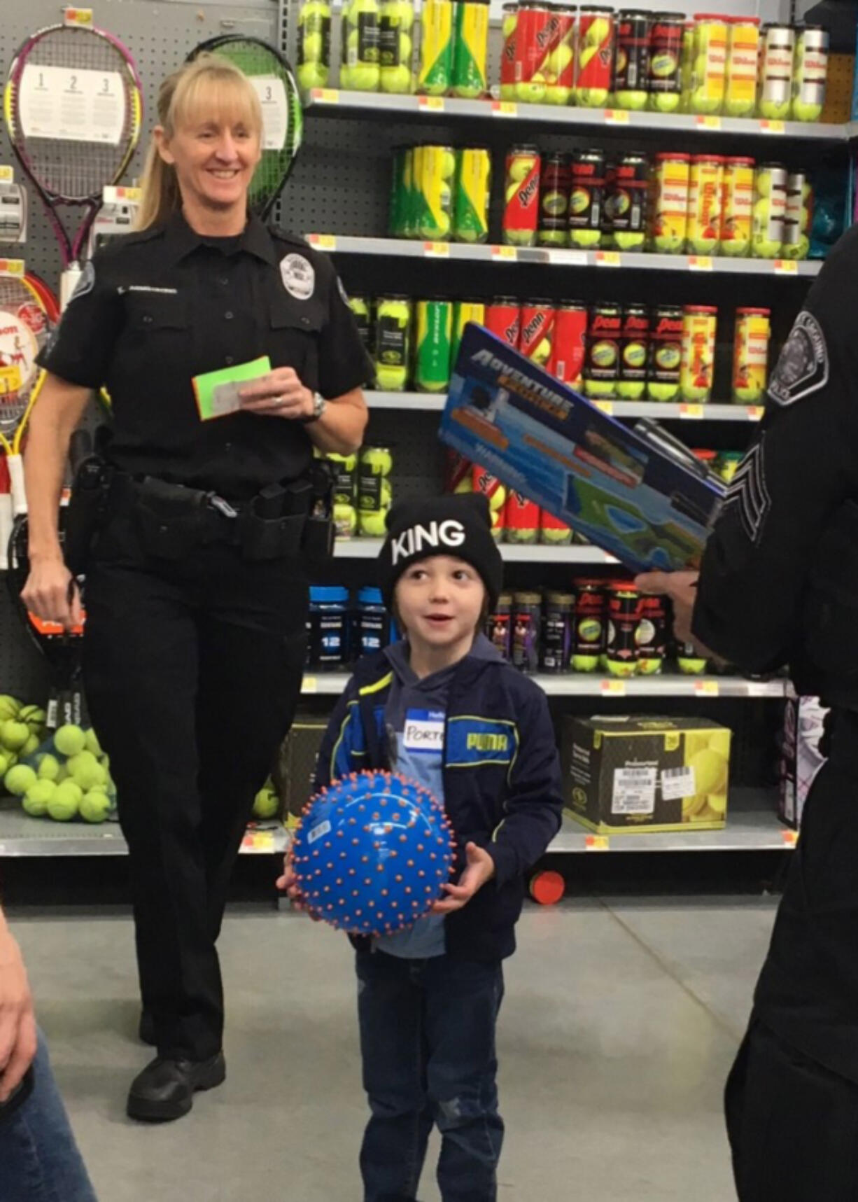 Battle Ground: Sgt. Kim Armstrong and four other Battle Ground police officers went shopping with eight kids from the city as part of the department’s Shop with a Cop program.