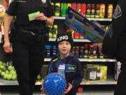 Battle Ground: Sgt. Kim Armstrong and four other Battle Ground police officers went shopping with eight kids from the city as part of the department’s Shop with a Cop program.