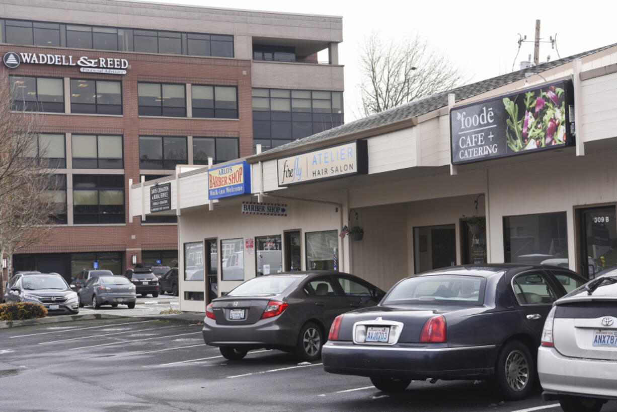 A strip mall where a new six-story tower is proposed. Property owners Al Angelo Co., who built the five-story building in the background, submitted a pre-application Dec. 14.