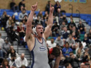 Jackson McKinney of Skyview, reacts to defeating Sam Malychewski of Camas in the 195 pound championship match.