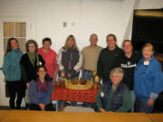 Hazel Dell: Some of the new graduates in the Washington State University Vancouver Master Food Preservers program, along with some already certified. Front row, from left: Jessika Brenin and Helen Redmond. Back row, from left: Karen Harris, Carol Moses, Zena Edwards, a WSU food and nutrition staffer, Laurie Burgess, Scotty Parrish, Kristen Clark, Debra Basquez and Jennifer Kootstra.