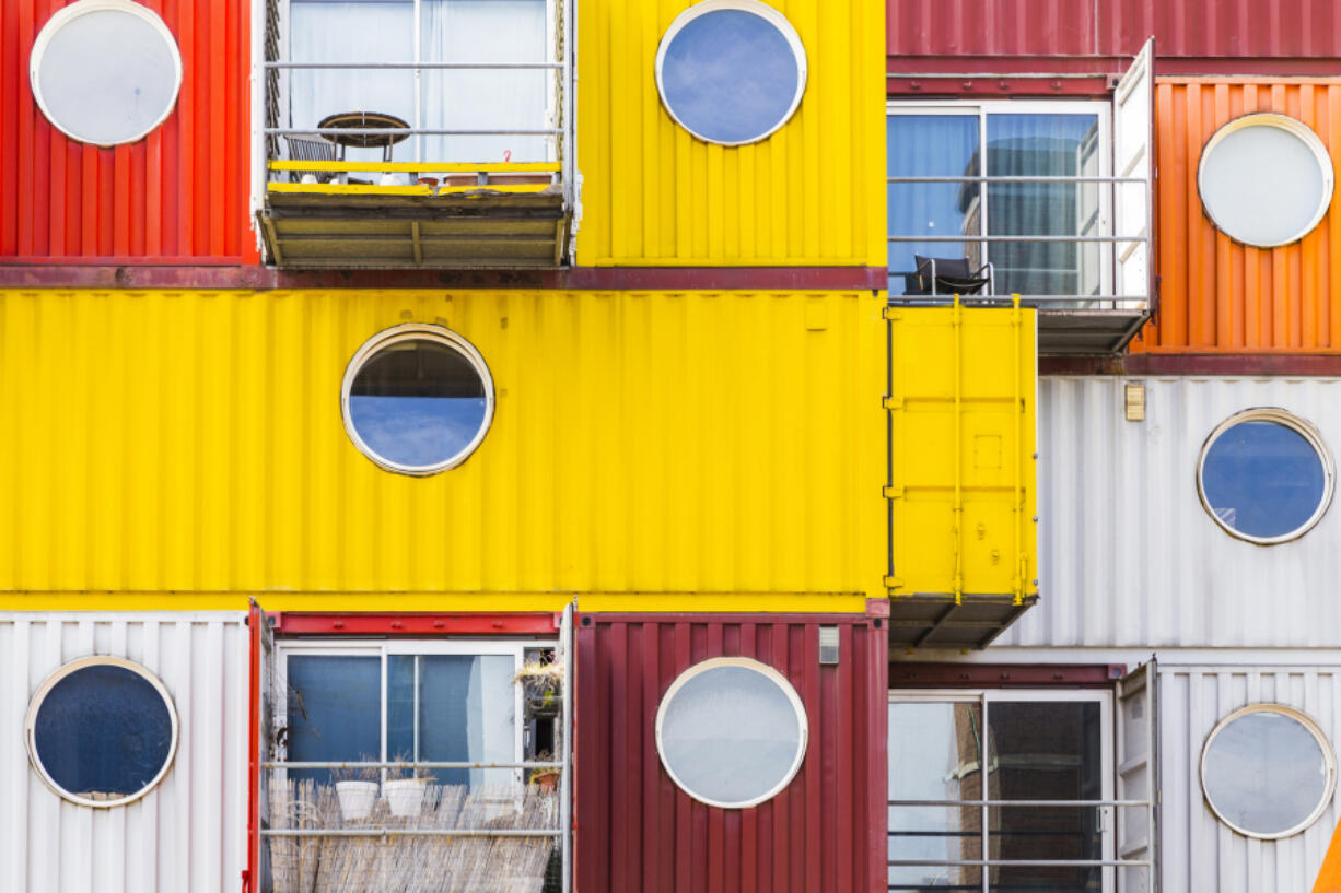 Modular homes built out of shipping containers, like these in England, are one of the possibilities for affordable housing. But, developers say, the zoning restrictions inhibit the cost savings.