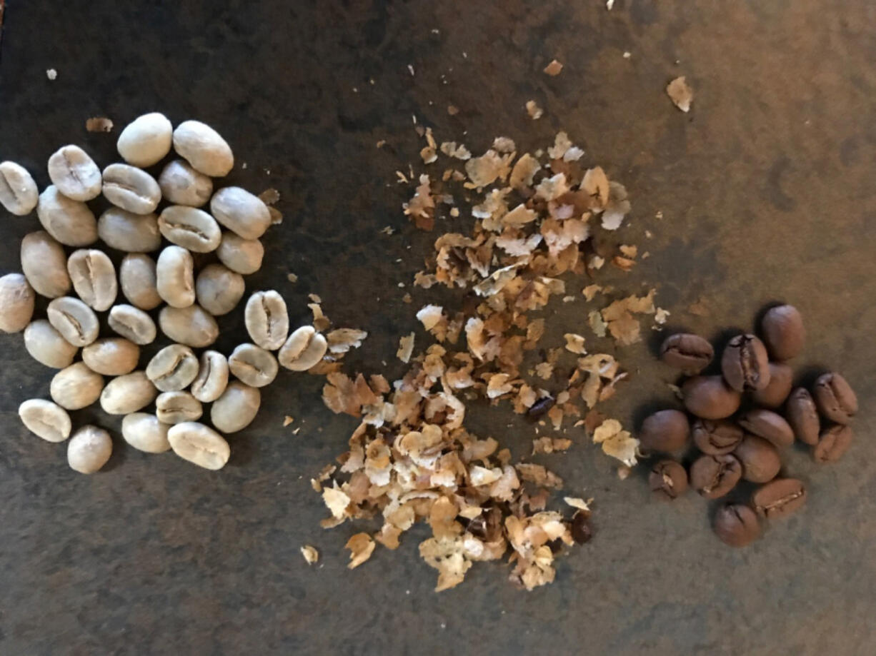 Did you know you can roast your own beans at home? Kenny Fletcher of Paper Tiger Roasters will sell you green, unroasted beans, left. Next to the green beans, you can see the chaff and roasted beans.