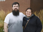 Cody Messick, left, and his wife, Kasey Cannon, outside the STEM building at Clark College in November.