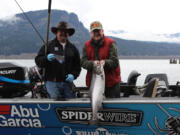 Terry Otto, (right), and host Buzz Ramsey with a Columbia River spring chinook. 166,700 “springer” adults are expected to pass over Bonneville Dam.