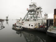 Gary Stonewall gives The Columbian a tour of a Tidewater Barge Lines tug in 2013.