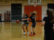 Morgan Stradley, left, is a four-year varsity player who led Battle Ground in scoring last season.