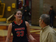 Courtney Clemmer and coach Scott Preuninger talk during a Camas game against Prairie earlier this season. A senior all-league post, Clemmer will be counted on more after the Papermakers lost fellow post Madison Freemon to injury.