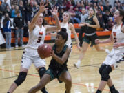 Evergreen’s Ahna Burney, here facing Washougal, scored a season-high 35 points Dec. 5 against Union.