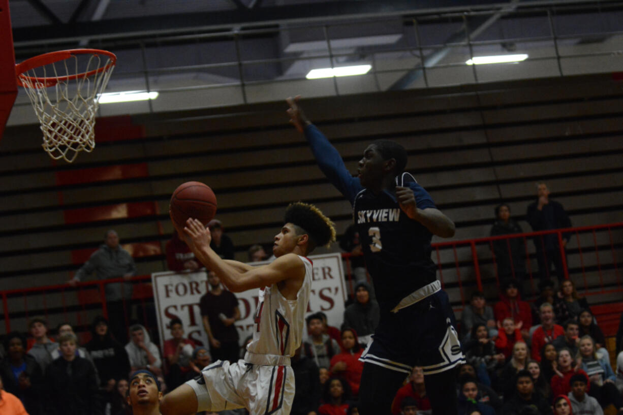 Jameel Morton, left, is a senior co-captain and leading scorer for a small but quick Fort Vancouver team.