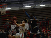 Jameel Morton, left, is a senior co-captain and leading scorer for a small but quick Fort Vancouver team.