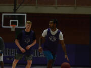 Sanjeet Singh, right, leads a four-guard lineup at Heritage.