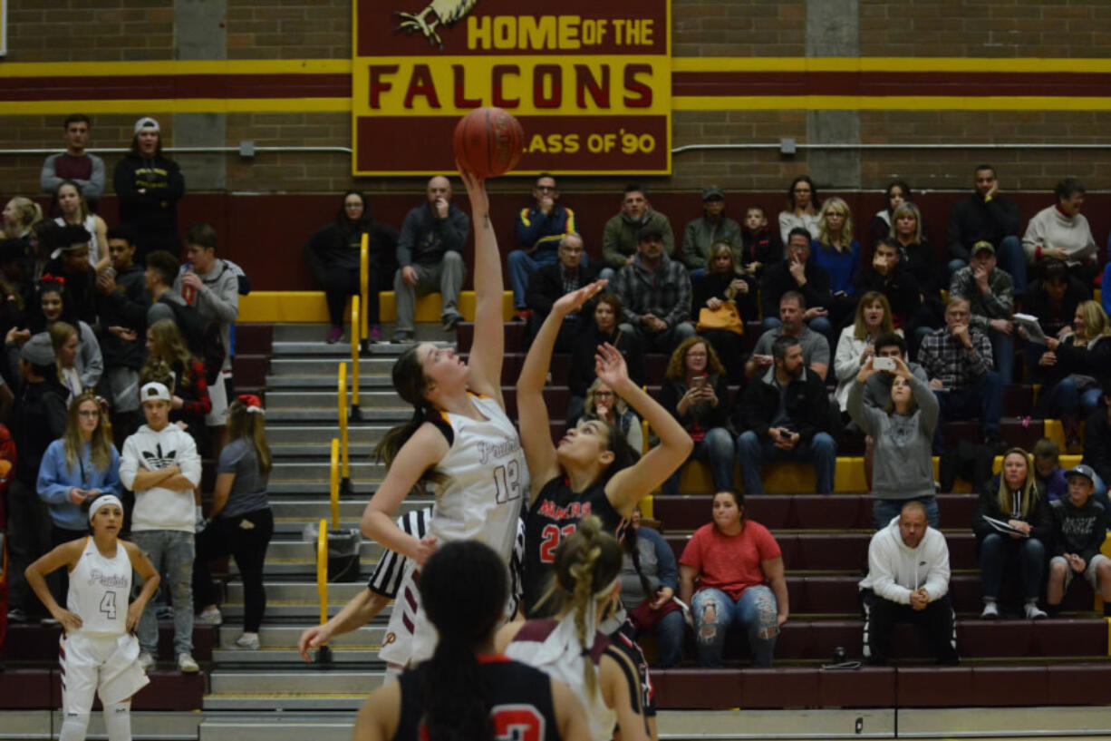 With 6-foot-3 post Brooke Walling, left, Prairie looks to remain high above its peers in the 3A Greater. St. Helens League.