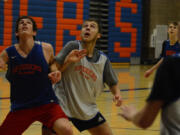 Micah Rice/The Columbian Ridgefield forward Kade Ramey, right, spent the offseason getting stronger.