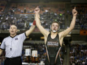 Battle Ground’s James Rogers has his hands raised as a champion after taking out Curtis’ Ketner Fields during their 4A 160 lb. State Wrestling championship match Saturday, Feb. 18, 2017, in Tacoma, Wash.