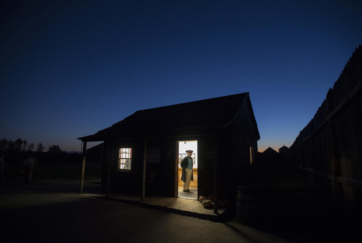 Costumed re-enactor Mike Riley waits for visitors at the entrance to Fort Vancouver National Historic Site on Oct. 28.