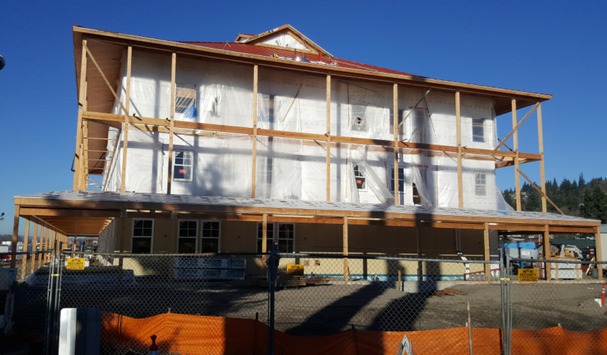 The future McMenamins Kalama Harbor Lodge rises in Kalama. The four-story hotel, restaurant and brew pub is slated to open on the Columbia River in the spring.