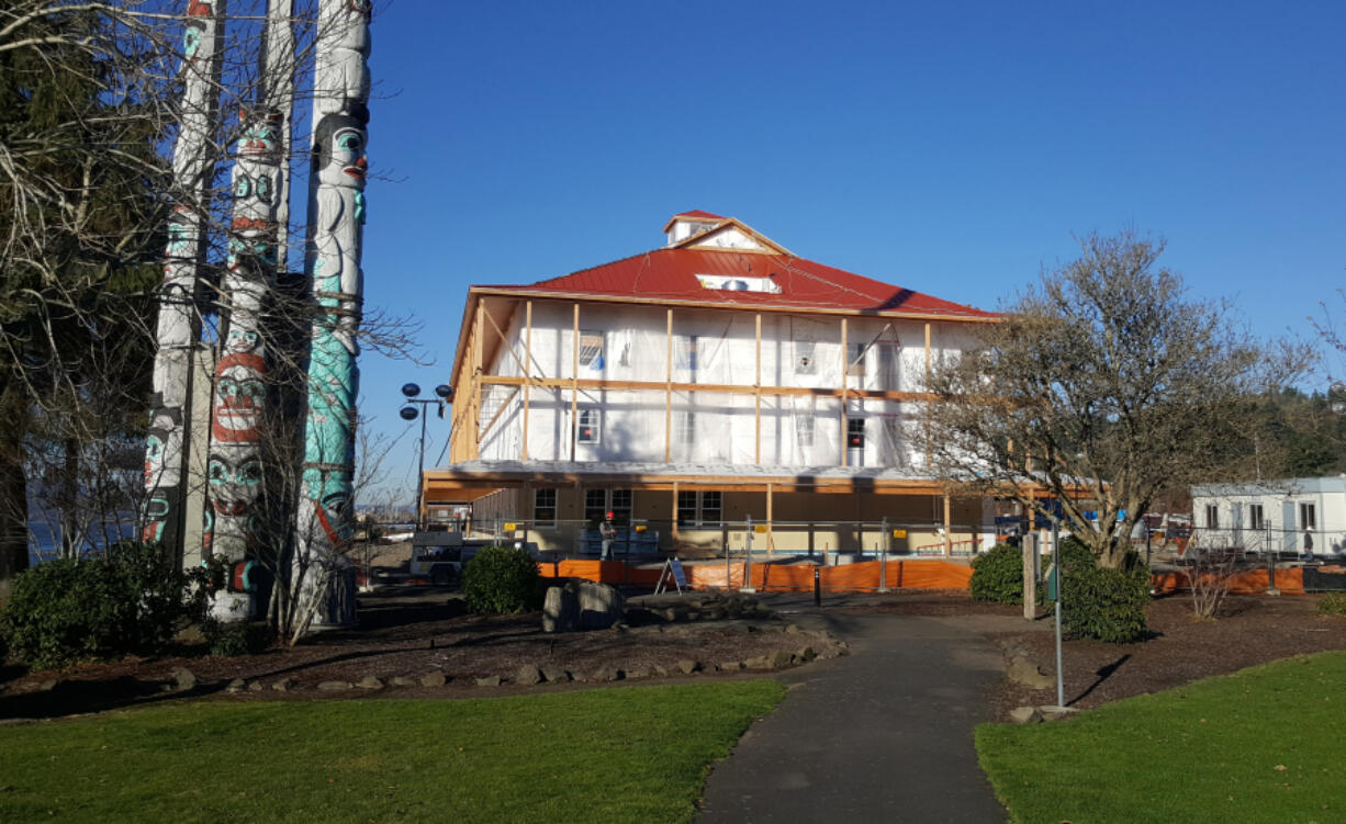 The future McMenamins Kalama Harbor Lodge rises near the Kalama totem poles.