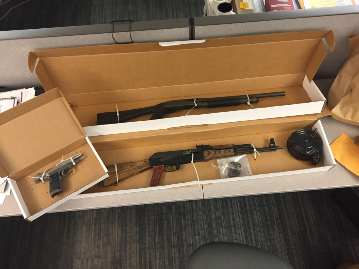 Law enforcement recovered an assault rifle, shotgun and handgun, as well as 125 grams of suspected heroin and evidence of pound-level methamphetamine distribution during the search of a Vancouver residence Thursday. One man was arrested and placed in federal custody.