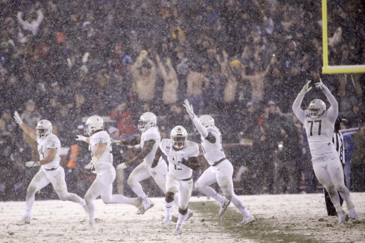 Army celebrates after defeating Navy in an NCAA college football game, Saturday, Dec. 9, 2017, in Philadelphia. Army won 14-13.