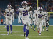 Buffalo Bills free safety Jordan Poyer (21) shows the ball after he intercepted a pass late in the second half of an NFL football game against the Miami Dolphins, Sunday, Dec. 31, 2017, in Miami Gardens, Fla. The Bills defeated the Dolphins 22-16.