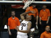 Oregon State’s Ethan Thompson (5) watches his shot go into the basket during the first half of an NCAA college basketball game against Colorado in Corvallis, Ore., Friday, Dec. 29, 2017. (AP Photo/Timothy J.