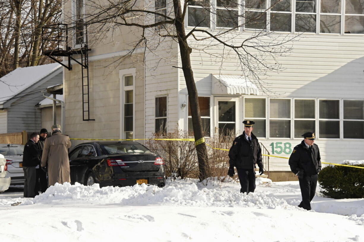 Troy police investigate multiple deaths on Tuesday in Troy, N.Y. Police say four people have been found dead and may have been killed in an apartment in New York’s capital region. The bodies were discovered Tuesday afternoon in a basement apartment in a house in Troy, a city near Albany. Troy police say the deaths are being treated as suspicious.