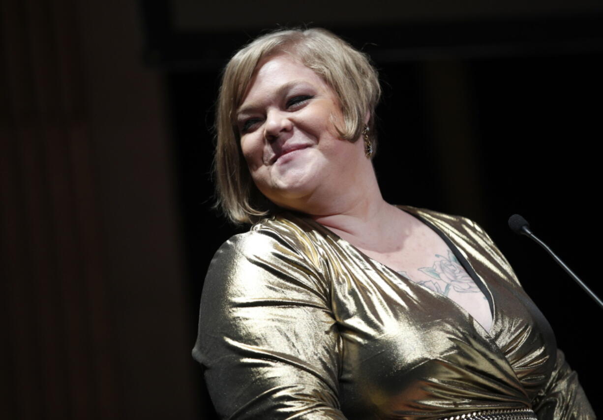 American writer, photographer, and activist, best known for being part of the body positive movement, Jes Baker, delivers a speech during a day against fat phobia in Paris, France, Friday, Dec. 15, 2017. Paris, the seat of global luxury industries and one of the world’s most image-conscious cities, is looking at its contradictions in the mirror with rising obesity levels and is launching a campaign against an often disregarded kind of discrimination: sizeism.