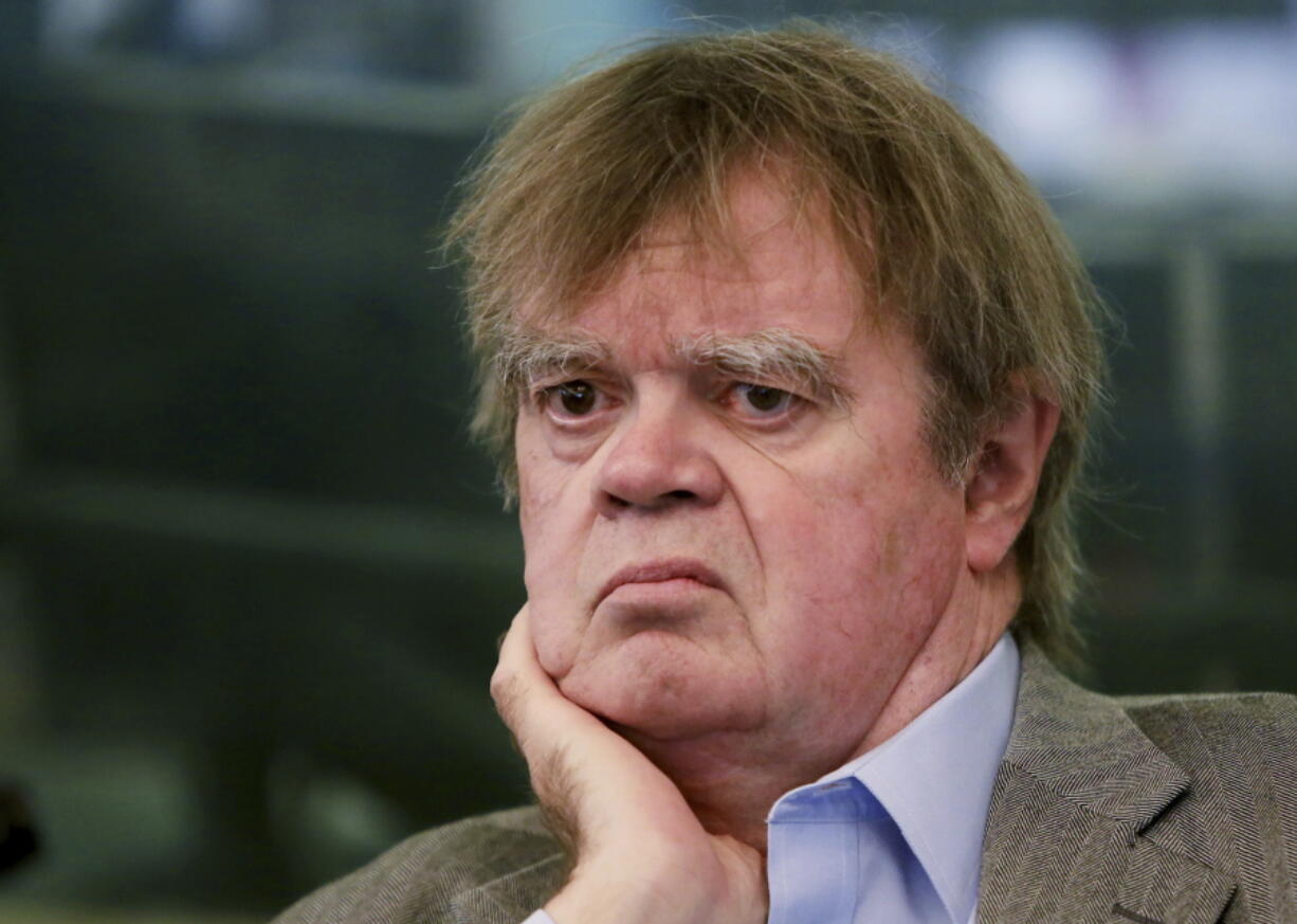 Garrison Keillor talks in 2014 with Daily Circuit host Tom Weber in the studios at Minnesota Public Radio in St. Paul, Minn. Keillor said Nov. 29 he has been fired by Minnesota Public Radio over allegations of improper behavior.