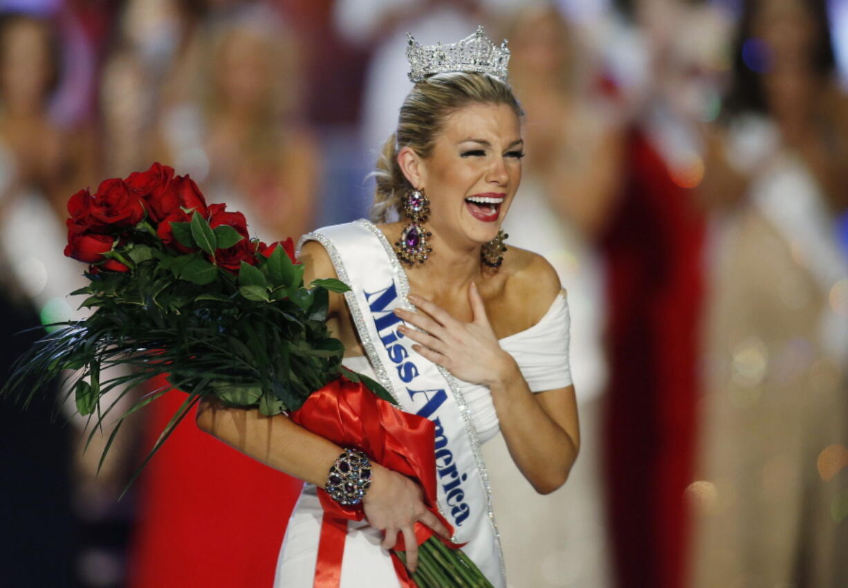 Miss New York Mallory Hytes Hagan reacts as she is crowned Miss America 2013 in Las Vegas. Trashed by emails sent by pageant officials, former Miss Americas will help choose the new leaders of the Miss America Organization. The group told The Associated Press Wednesday, Dec. 27, 2017, that it is enlisting the help of former Miss Americas and state directors to recommend the next generation of leaders for the pageant. Hagan’s sexual habits were mocked in the emails.