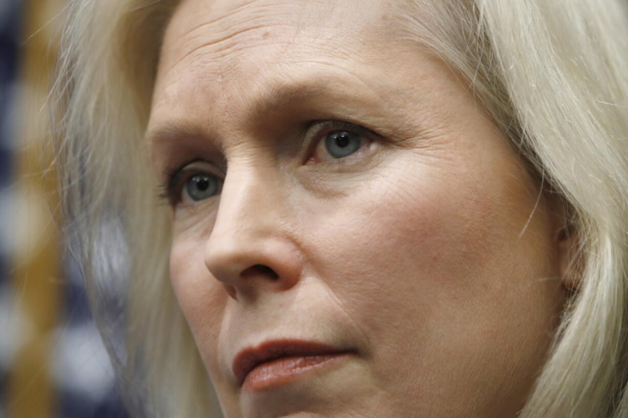 Sen. Kirsten Gillibrand, D-N.Y., listens during a news conference on sexual harassment Wednesday on Capitol Hill in Washington. Sen. Al Franken's support among his fellow Democrats is cratering as a host of female Democratic senators Wednesday called upon him to resign.