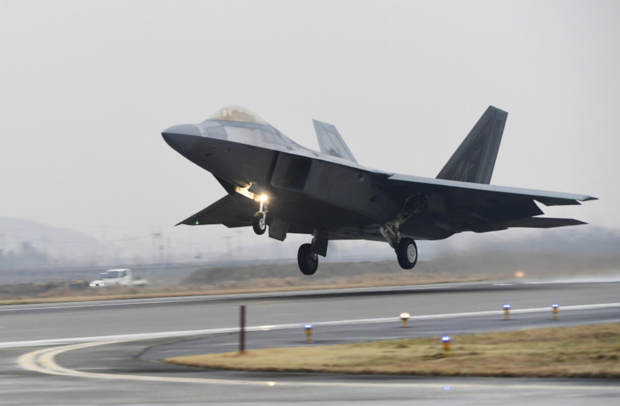 A U.S. Air Force F-22 Raptor takes off from a South Korean air base in Gwangju, South Korea, Monday, Dec. 4, 2017. The United States and South Korea have started their biggest-ever joint air force exercise with hundreds of aircrafts including two dozen stealth jets.