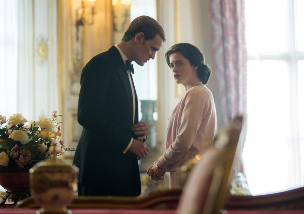 In this image released by Netflix, Claire Foy, right, and Matt Smith in a scene from “The Crown,” premiering its second season on Friday, (Robert Viglasky/Netflix via AP)