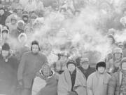 Fans watch the Green Bay Packers play the Dallas Cowboys in the NFL Championship game on Dec. 31, 1967, in Green Bay, Wis. Simply dubbed the Ice Bowl, those who participated in Cowboys-Packers that day at Lambeau Field still shiver when talking about it.