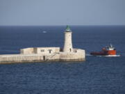 A boat passes through the entrance to the Grand Harbour in Valletta, Malta. Valletta was declared one of two European Capitals of Culture for 2018, kicking off Jan. 14-21 with an island-wide Maltese Festa. The other European Capital of Culture is the Dutch city of Leeuwarden, the capital of Friesland.