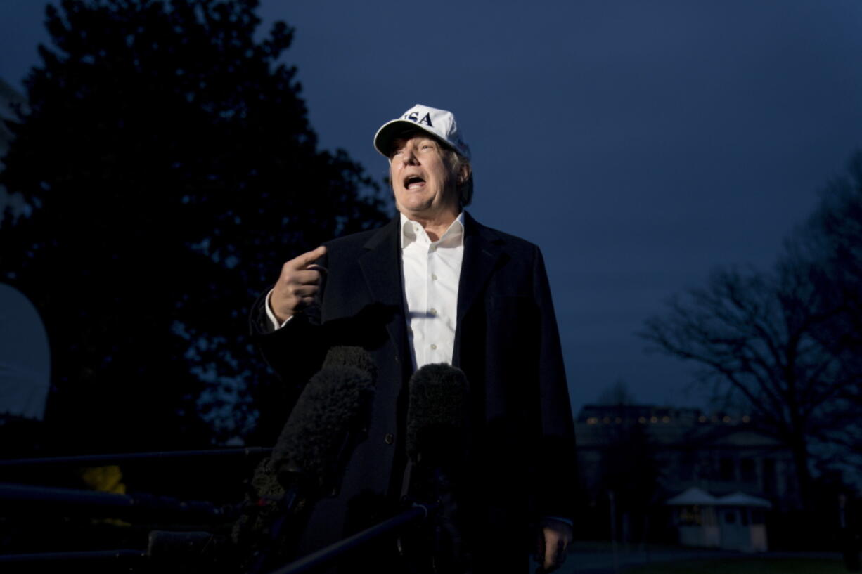 President Donald Trump speaks to members of the media on the South Lawn at the White House in Washington, Sunday.