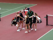 Portland State women’s tennis coach Jay Sterling gathers his players prior to their match against UC Davis on Saturday, Feb. 20, 2018, at Club Green Meadows in Vancouver.