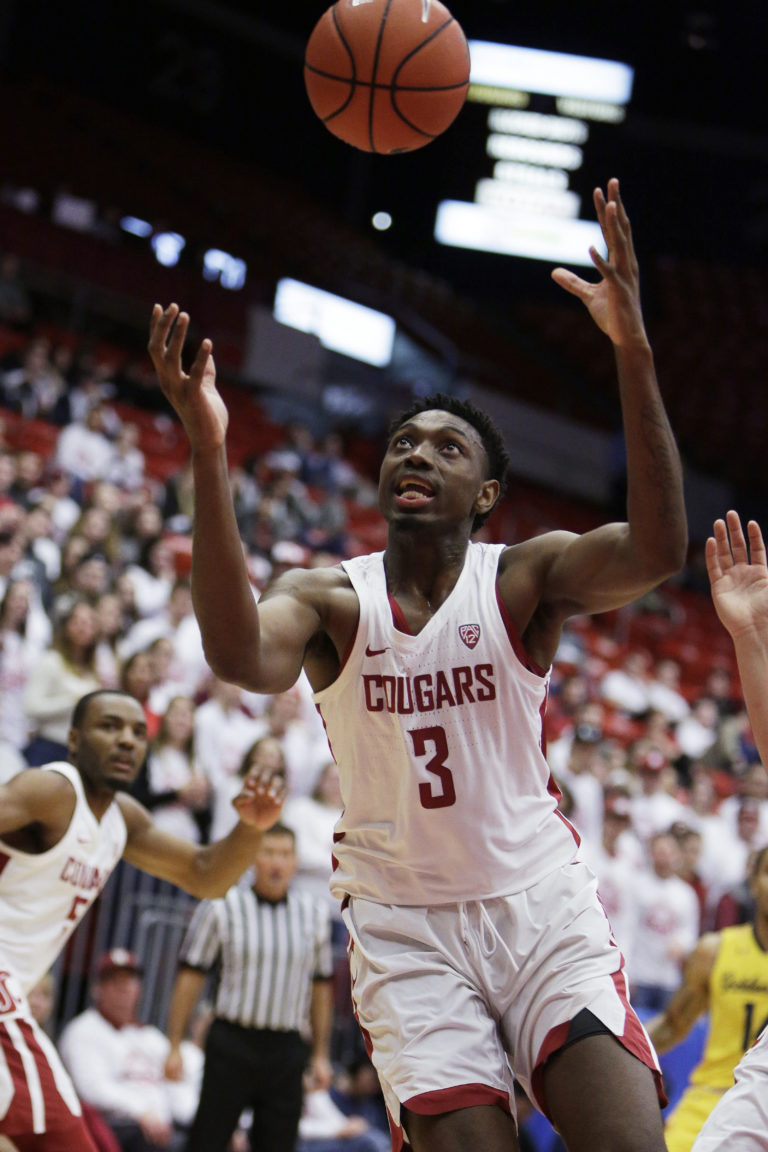 Washington State forward Robert Franks (3) goes after a rebound during the first half of an NCAA college basketball game against California in Pullman, Wash., Saturday, Jan. 13, 2018.