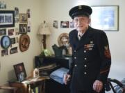 Jim Christian, a 100-year-old Navy veteran, is pictured in his World War II uniform at his home in Vancouver, Ariane Kunze/The Columbian