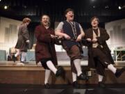 A colonial chorus line: Heritage High School junior Dakota Adams, left, senior Jordyn Fields, and sophomore Connor Randall step-kick their way to American independence in the musical “1776.” Alisha Jucevic/The Columbian