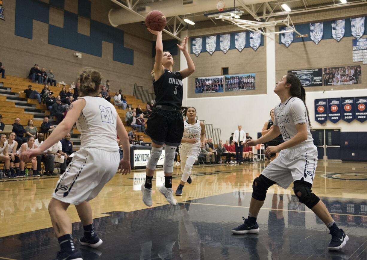 Union's Mason Oberg (3) releases a shot during Friday night's game against Skyview at Skyview High School in Vancouver on Jan. 5, 2018.