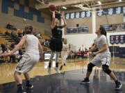 Union's Mason Oberg (3) releases a shot during Friday night's game against Skyview at Skyview High School in Vancouver on Jan. 5, 2018.