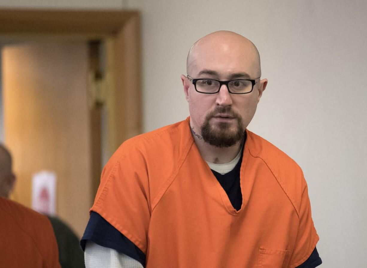 Christopher Ollar appears in Clark County Superior Court Friday to change his plea to guilty of assault in the second degree.