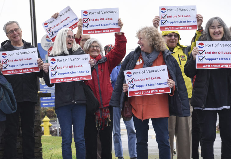 Port of Vancouver oil terminal opponents celebrate Tuesday January 9, 2018, at the Port of Vancouver, following the Port of Vancouver’s board of commissioners’ unanimous decision to put an end date on Vancouver Energy’s rolling lease for a proposed oil terminal.