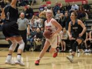 Camas’ Haley Hanson (11) eyes the basket for a shot during Tuesday night’s 4A Greater St. Helens League game against rival Union. Camas won 46-44.