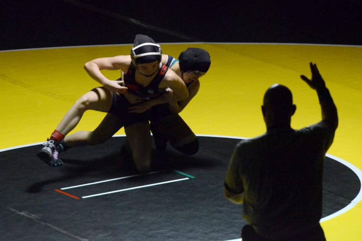 Union’s Kayla Brosius beats Kelso’s Trinity Lien to win the 115-pound weight class at the 47th Clark County Wrestling Championship.